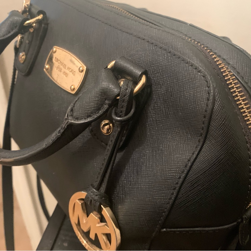 Michael Kors black mini satchel.